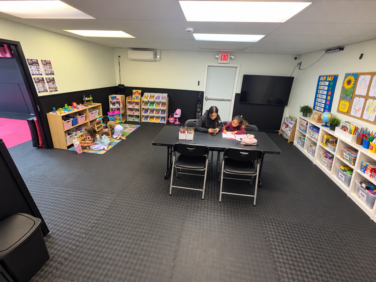 Digitally enhanced view of our after-school homework table and organized supplies
